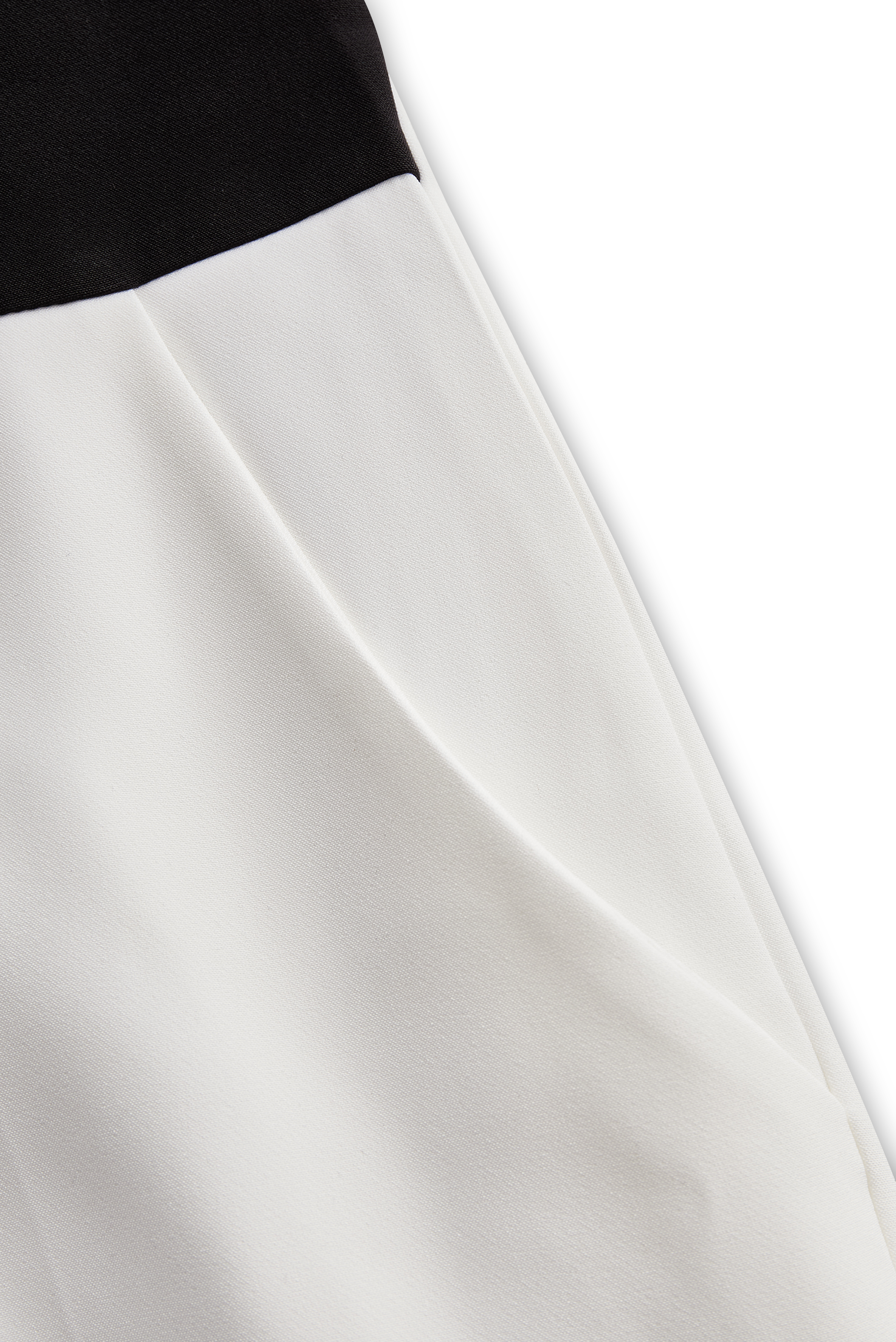 Sleek White Jumpsuit With Dual Button Detail And Black Lapel