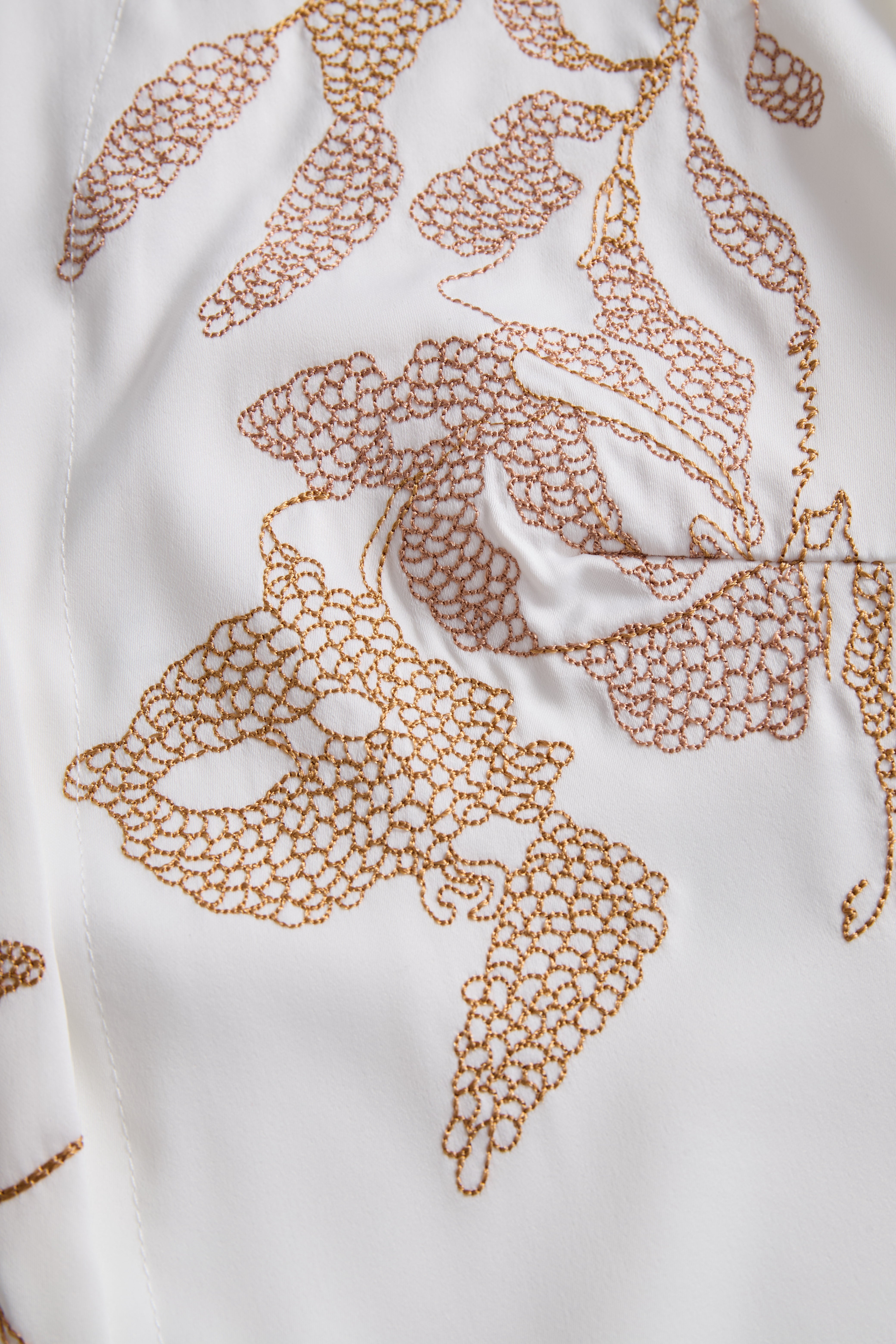 White Embroidered Blouse with Gold Floral Details