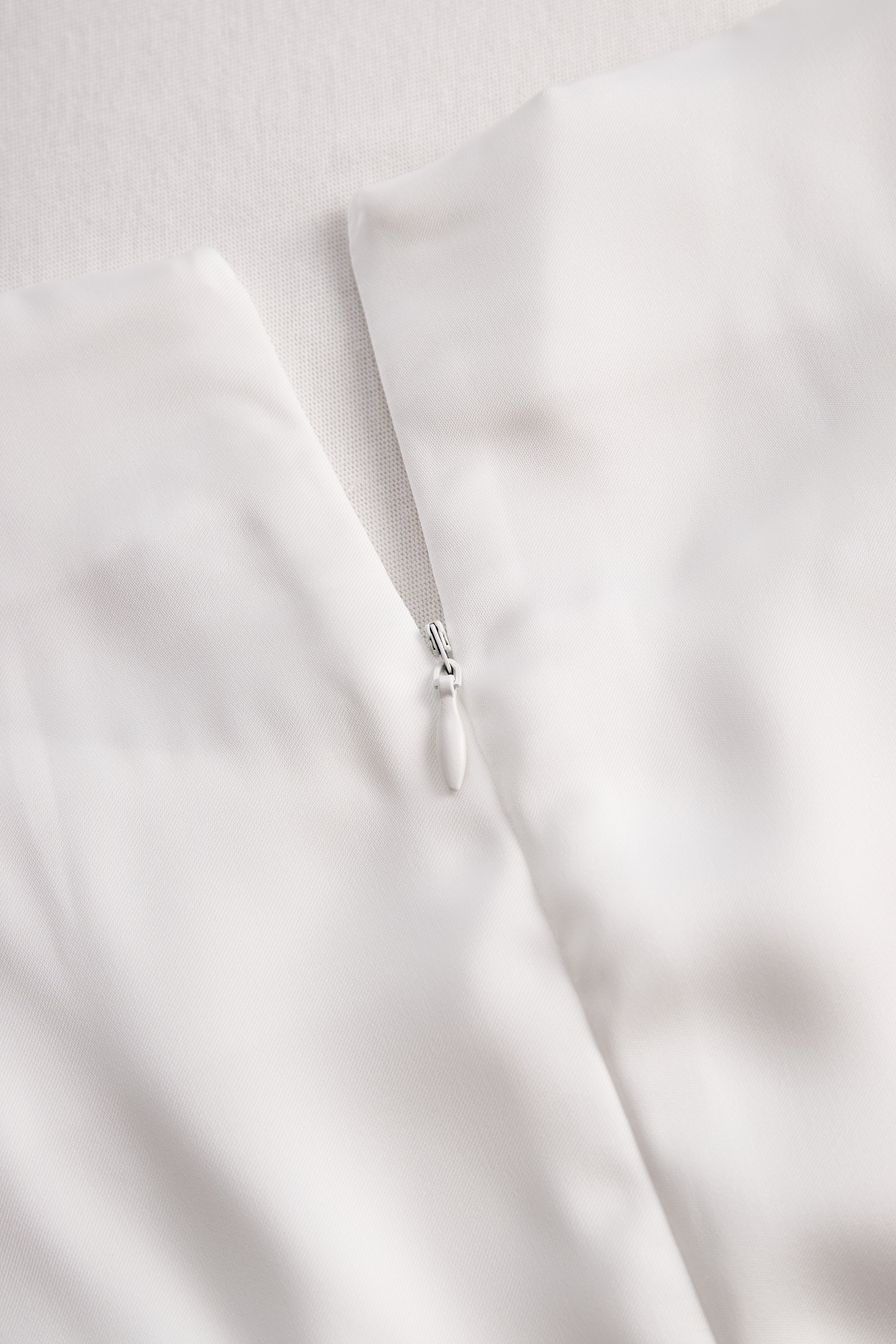 Elegant White Draped Top with Button Detail