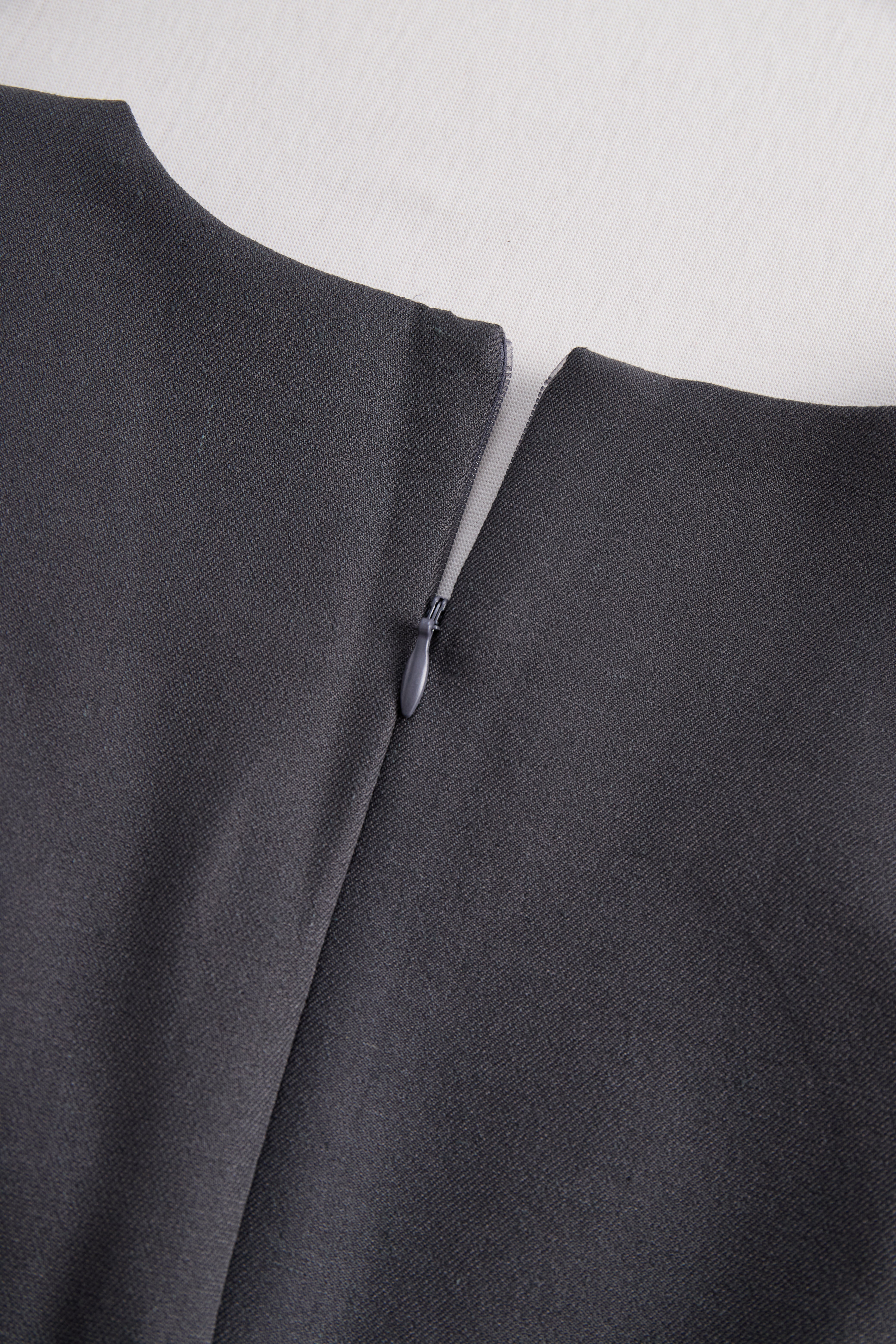 Sophisticated Sleeveless Peplum Jumpsuit In Charcoal Gray