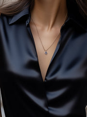 Sleek Black Satin Sleeveless Blouse