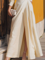 Elegant Ivory Wrap Dress With Slit And Front Knot Detail